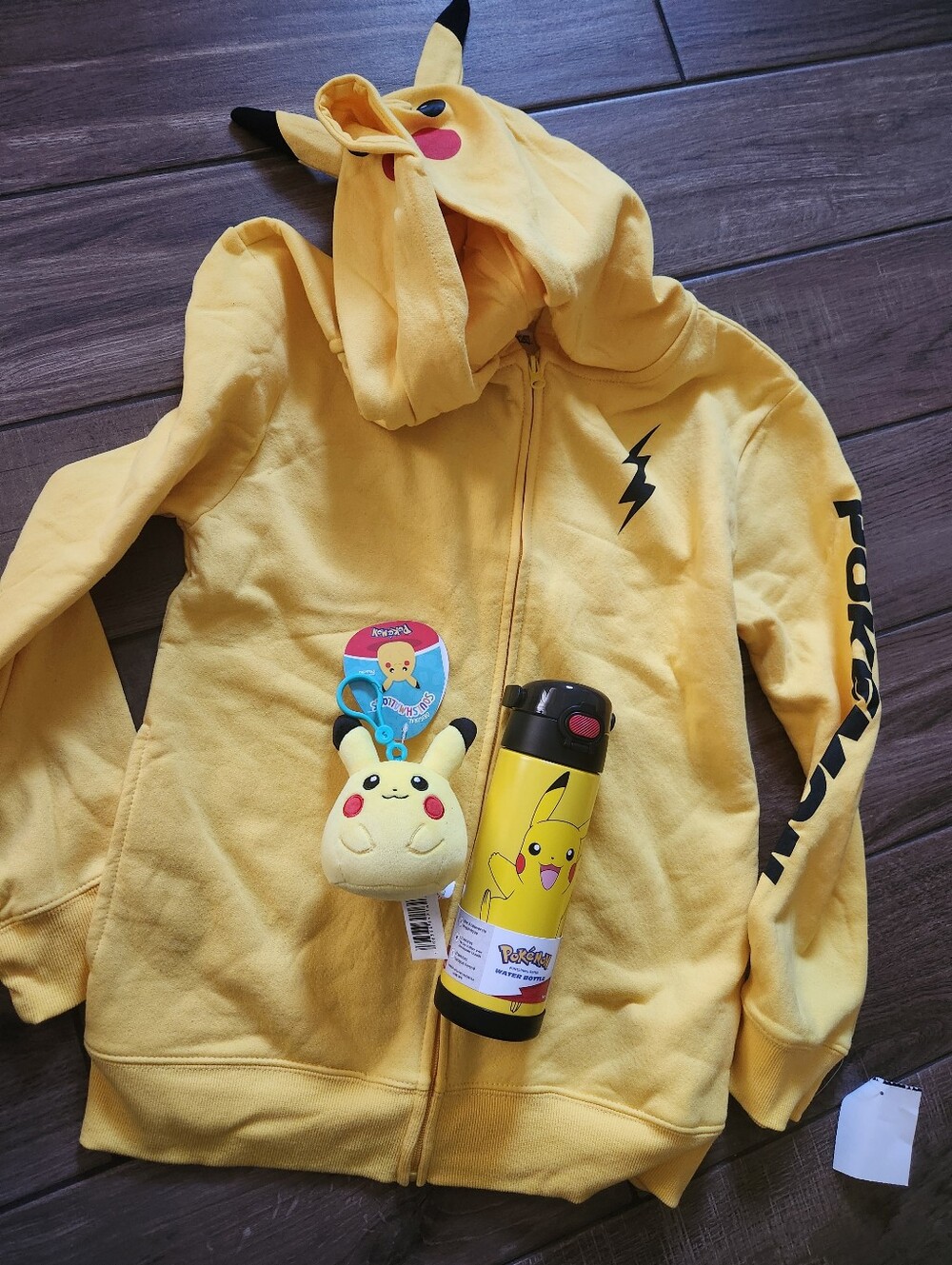 Pikachu Yellow Kids Zip-Up Hoodie with Hood Ears Water Bottle And Squishmallow.